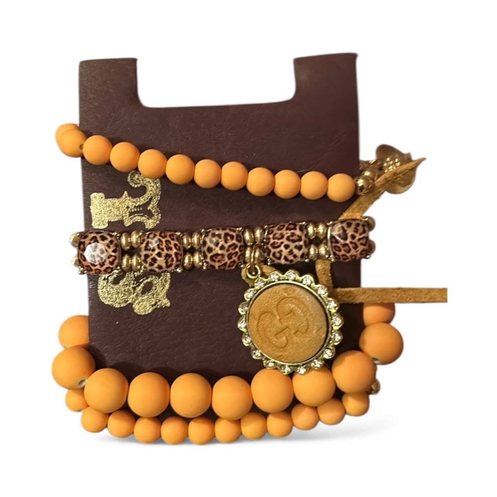 New upcycled bracelet stack with Mustard yellow GG patch bought from boutique Tx